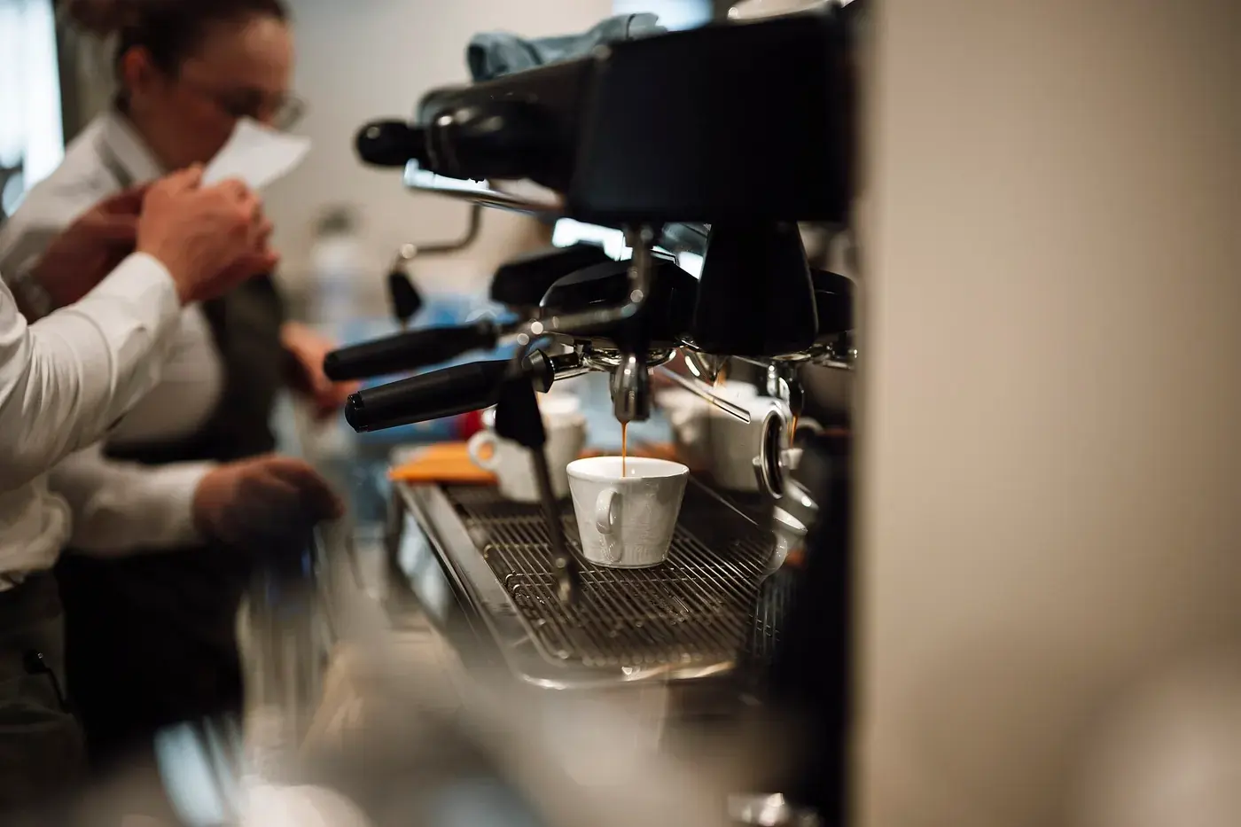 Student working a part-time cafe job in New Zealand